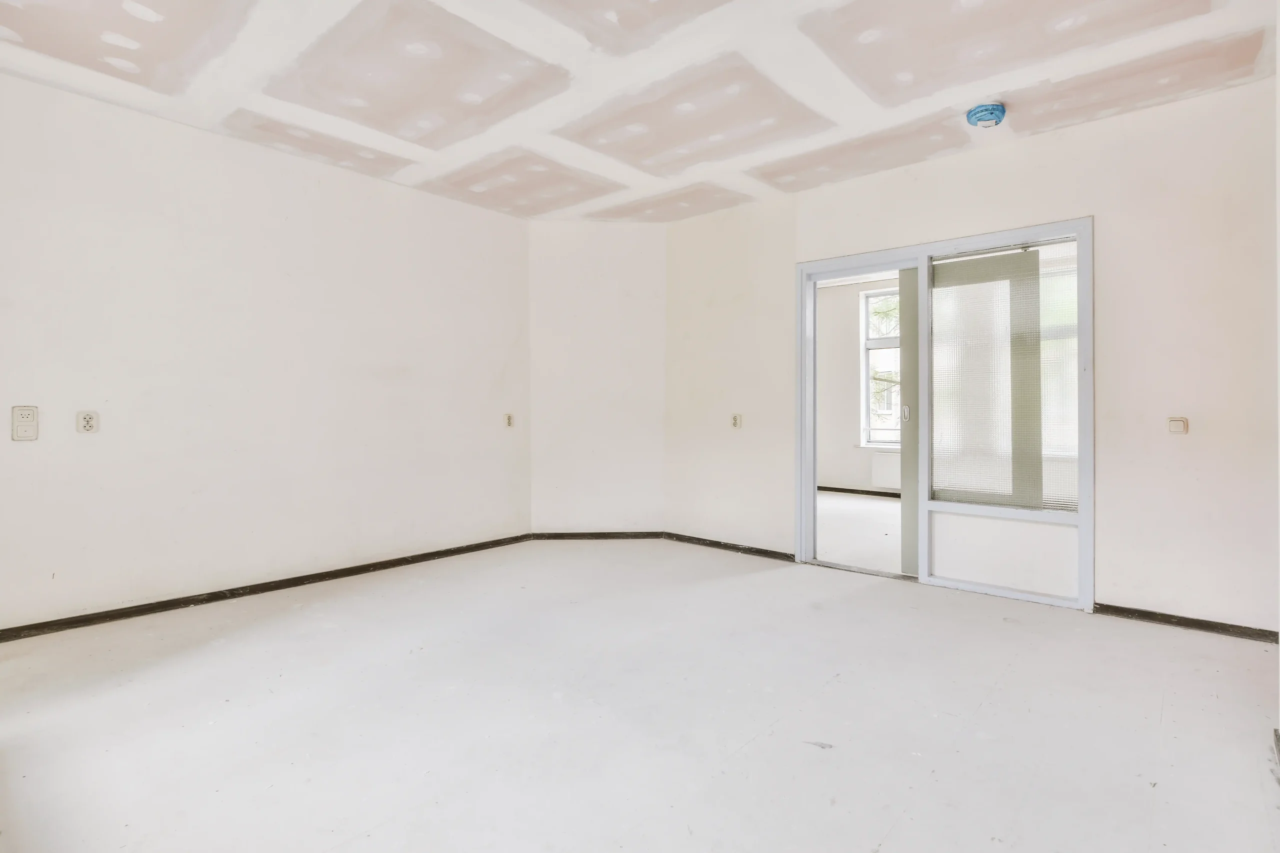 white-room-interior-with-sliding-door-and-windows-2026-03-18-09-56-05-utc